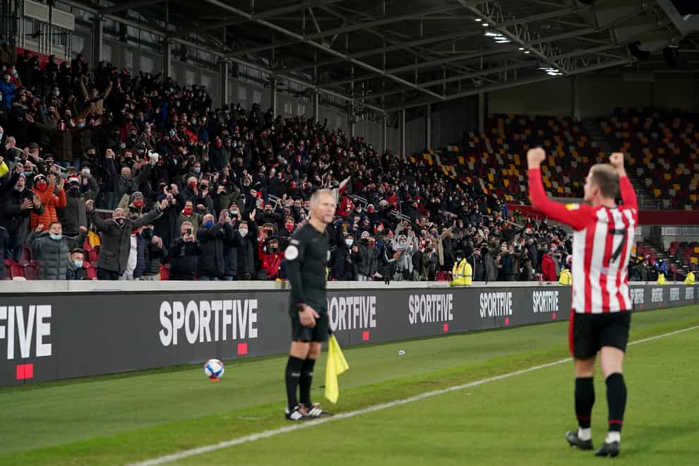 Sergi Canos celebrates scoring against Nottingham Forest in front of the Brentford fans at the Brentford Community Stadium
