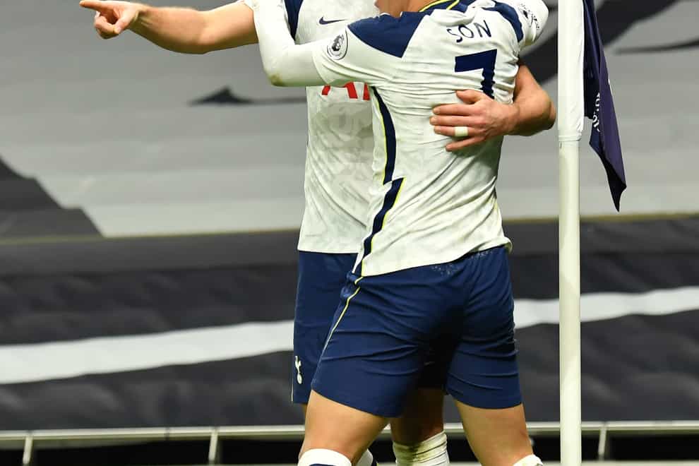 Harry Kane celebrates scoring his side’s second goal of the game with team-mate Son Heung-min