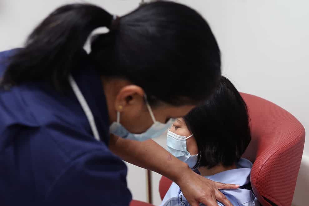 Nurse simulating vaccination