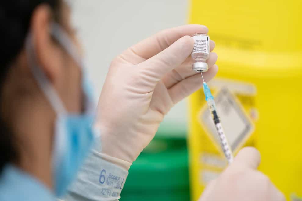 A member of medical staff prepares a Pfizer-BioNTech Covid-19 vaccine
