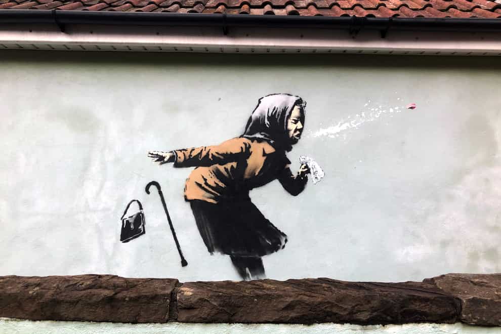 Artwork of woman sneezing in Bristol