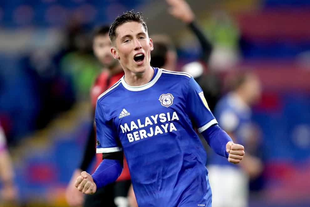Cardiff's Harry Wilson could miss the Welsh derby with Swansea after suffering an arm injury
