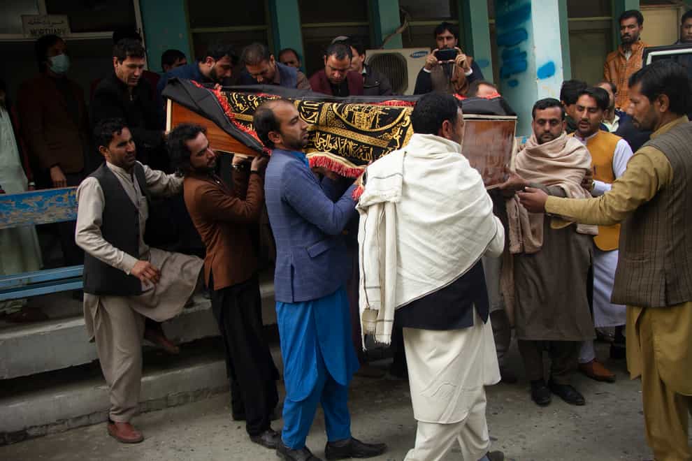 Malala Maiwand's body is carried by relatives