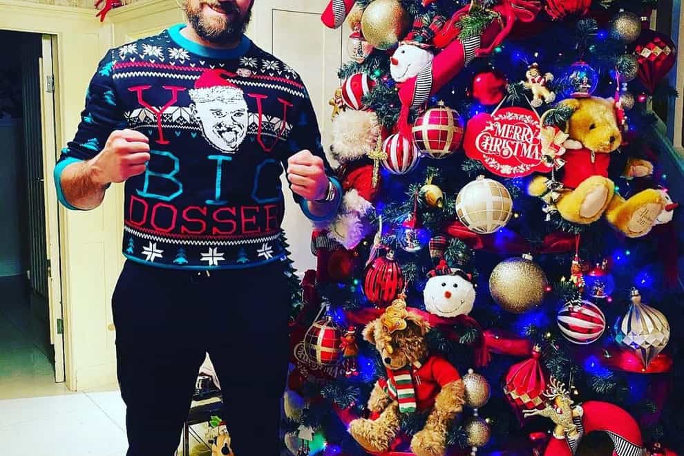 Fury showed off his collection of Christmas jumpers after declining to attend Joshua-Pulev this weekend