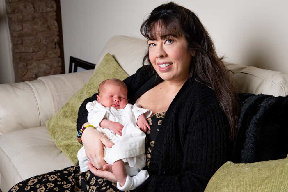 Rebecca Brown, 40, with her newborn daughter Ethel