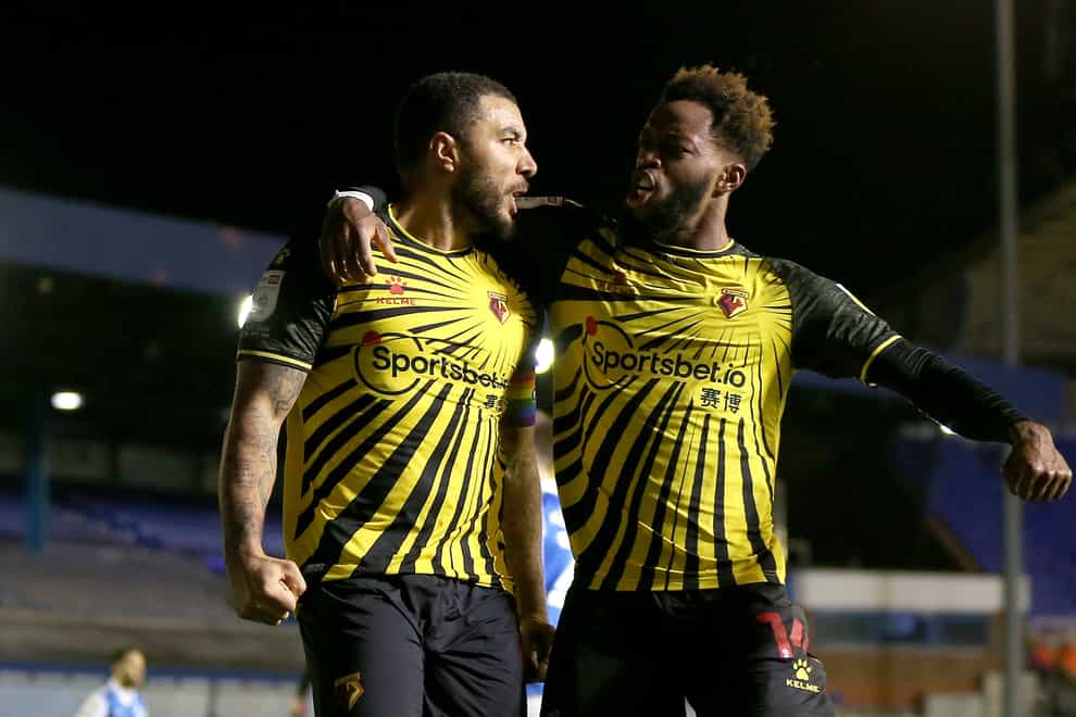 Watford’s Troy Deeney (left) celebrates scoring a late penalty winner against Birmingham with team-mate Nathaniel Chalobah