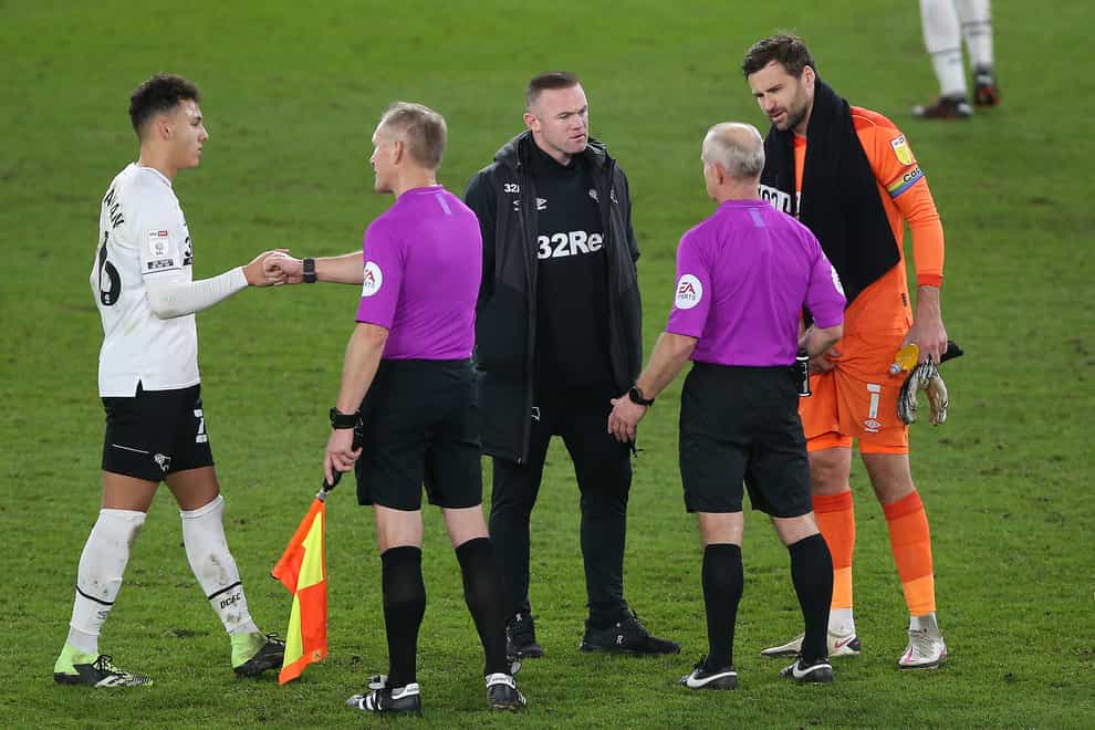 Derby's interim manager Wayne Rooney felt referee Andy Woolmer should have awarded his side a penalty