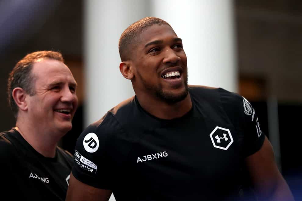 Trainer Robert McCracken (left) says Anthony Joshua (right) is getting better and better