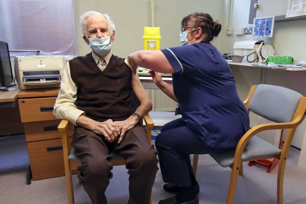 Brian Horne receives the coronavirus vaccine