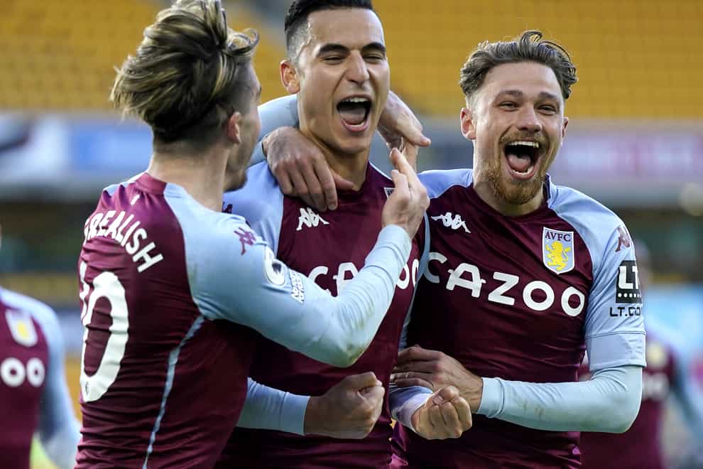 Aston Villa’s Anwar El Ghazi (centre) is congratulated by his team-mates after scoring against Wolves