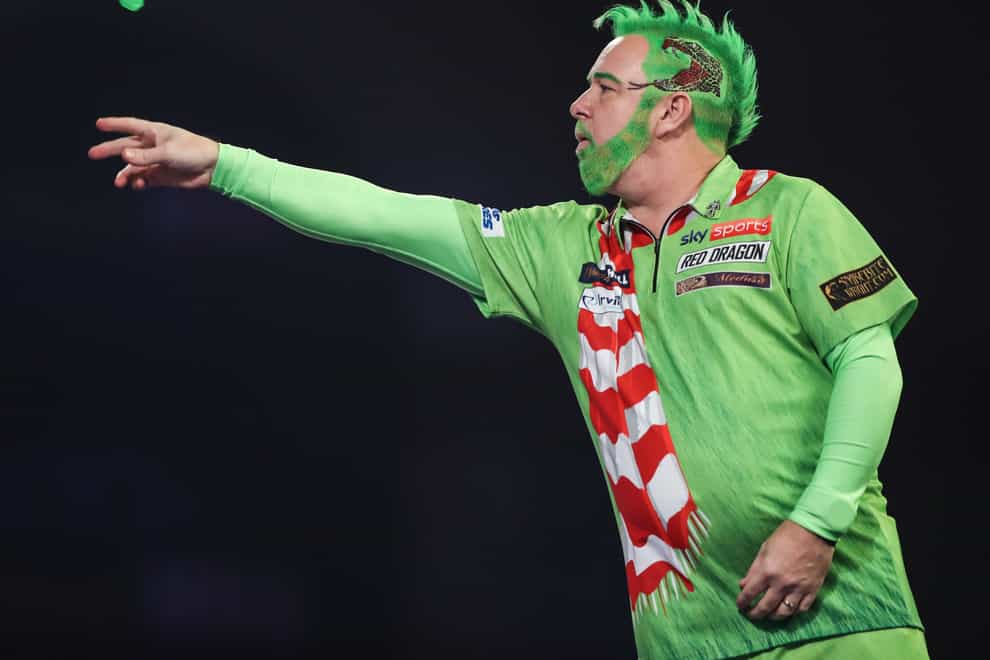 Peter Wright came dressed as the Grinch for his opening match of the World Championships