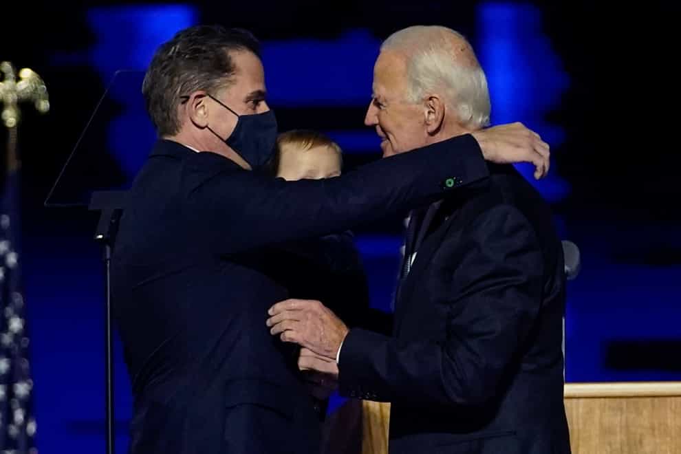 President-elect Joe Biden, right, embraces his son Hunter Biden