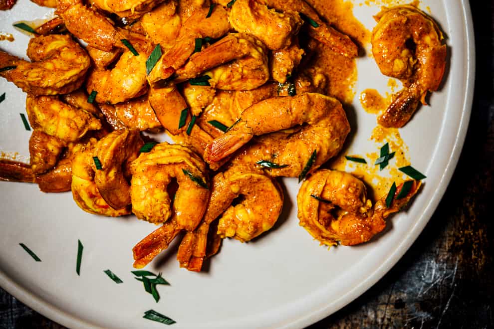 Masala shrimp from The Flavor Equation: The Science of Great Cooking Explained + More Than 100 Essential Recipes by Nik Sharma (Nik Sharma/PA)
