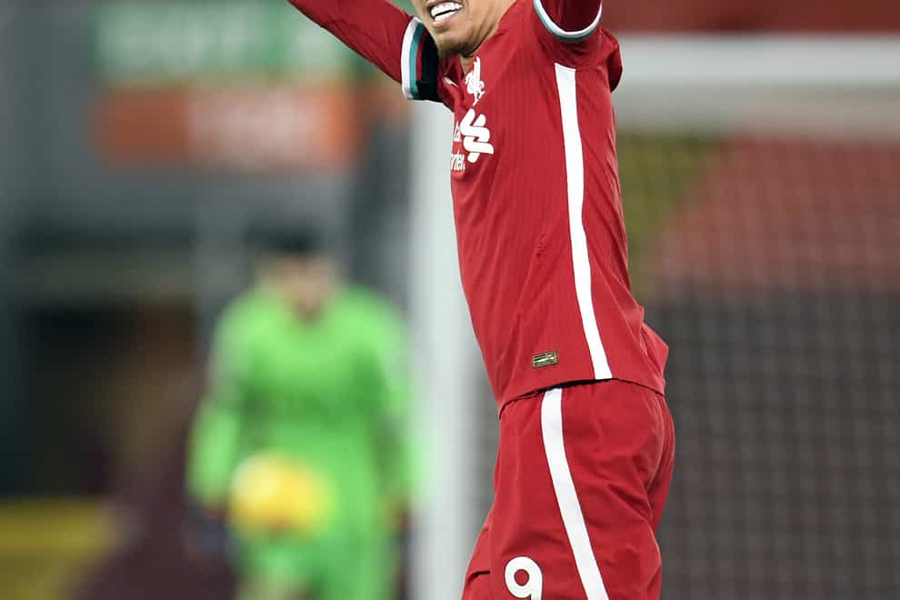 Roberto Firmino celebrates scoring the winning goal