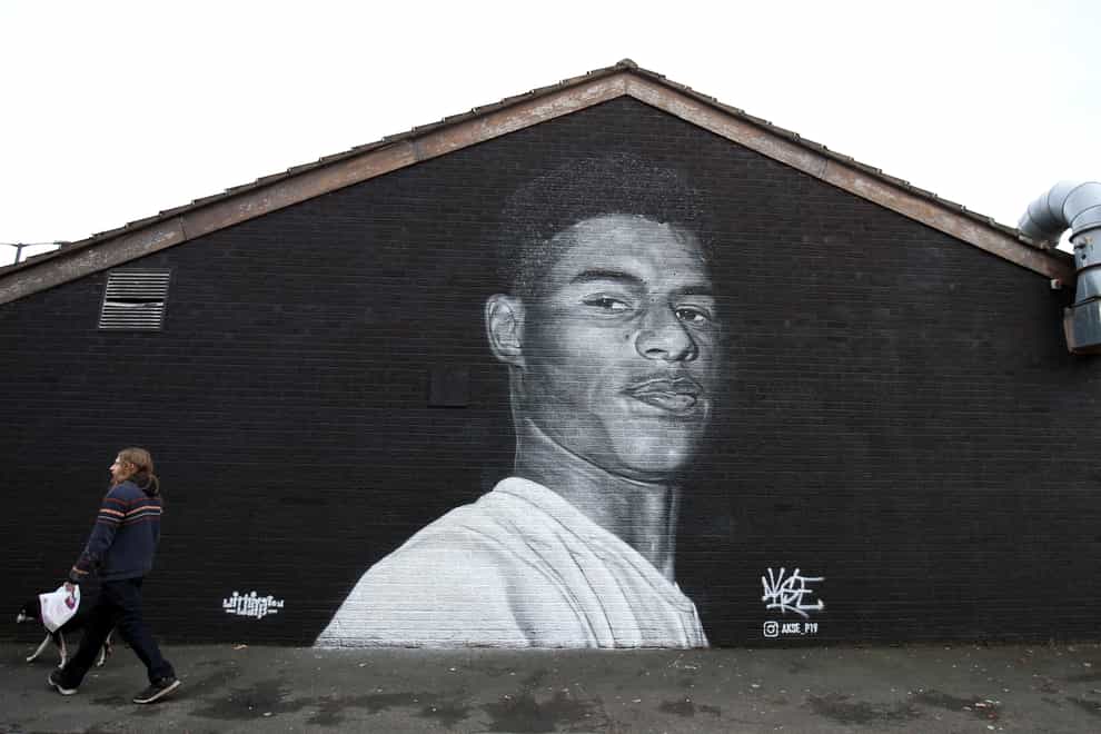 A mural of Manchester United striker Marcus Rashford by Street artist Akse on the wall of the Coffee House Cafe on Copson Street, Withington