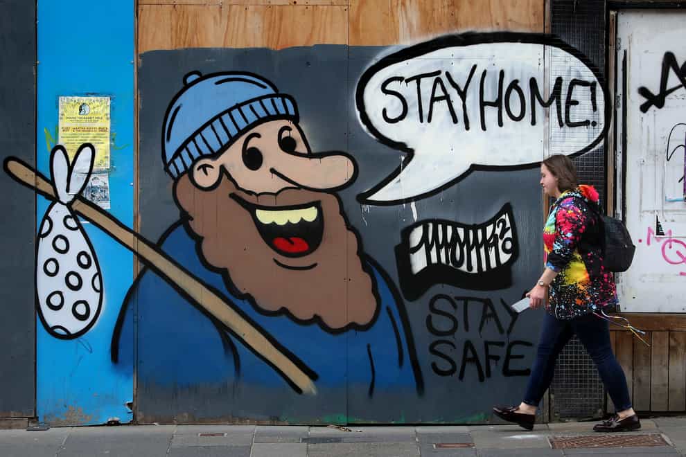 Coronavirus graffiti in Glasgow warning people to 'Stay home'