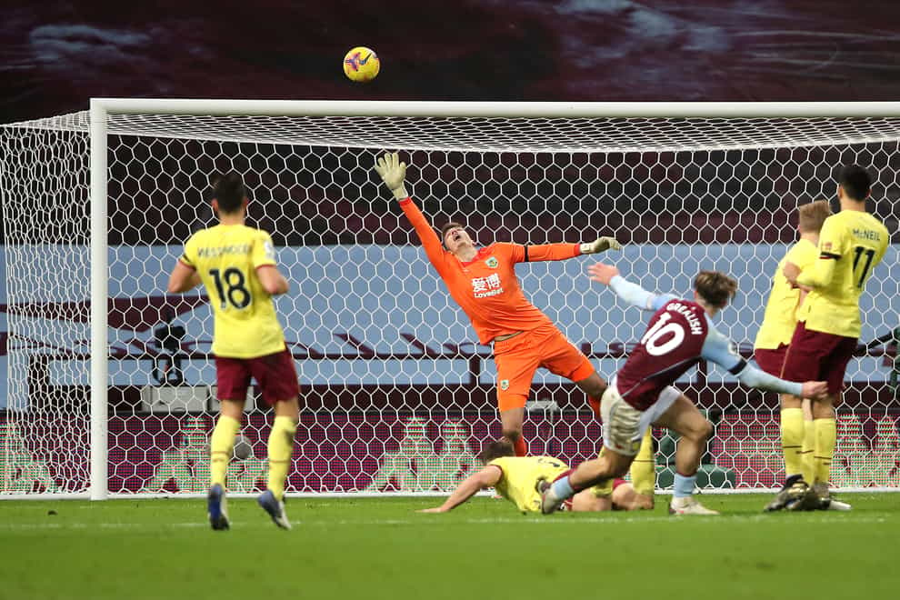 Jack Grealish fires a shot over