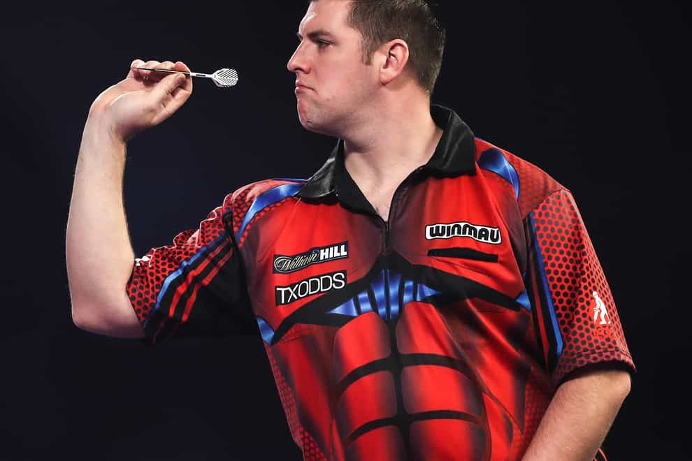 Daryl Gurney prepares to throw a dart with his right hand