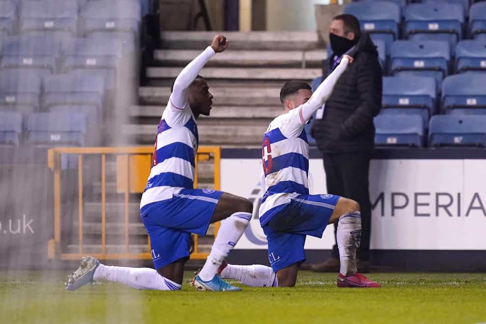 QPR's Ilias Chair, right, and Bright Osayi-Samuel take the knee in celebration of a goal against Millwall