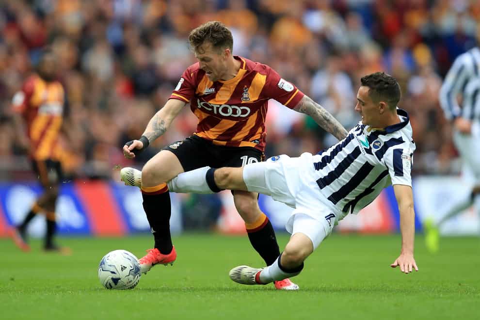 Bradford will check on Billy Clarke, left, ahead of the clash with Cambridge