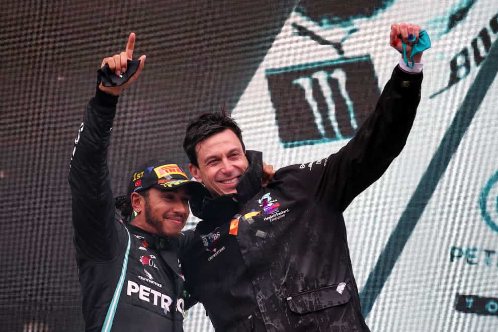 Toto Wolff (right) has no doubt Lewis Hamilton will remain a Mercedes driver