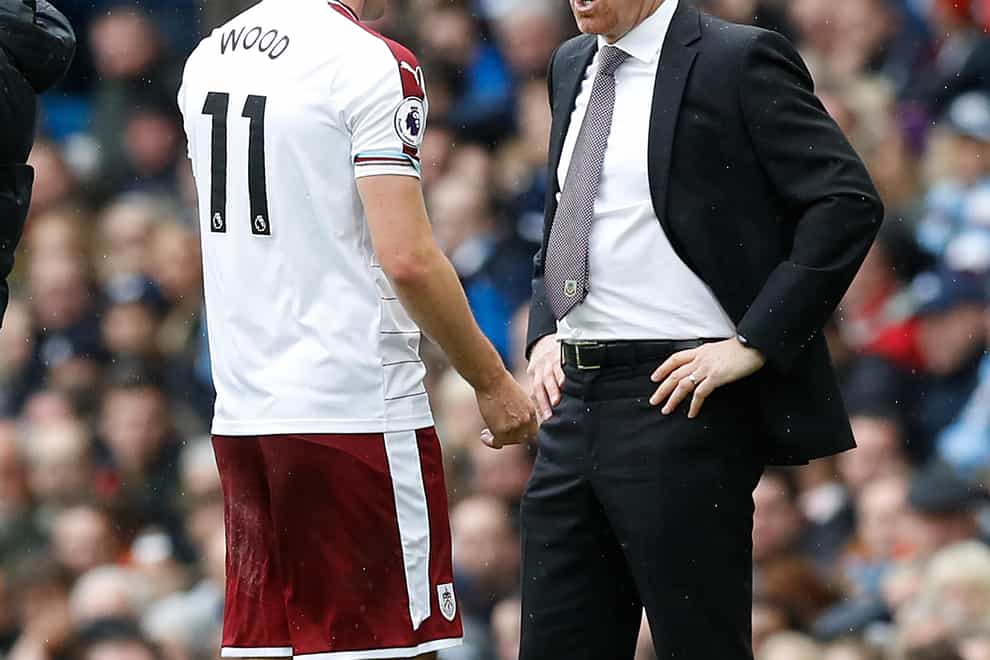 Burnley boss Sean Dyche (right) believes his side, including striker Chris Wood (left) will rediscover their goals touch