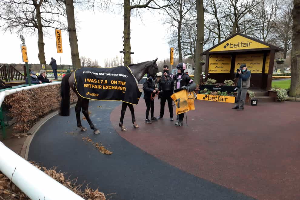 Brian Hughes with Sam's Adventure after their victory in the Betfair Tommy Whittle Handicap Chase at Haydock