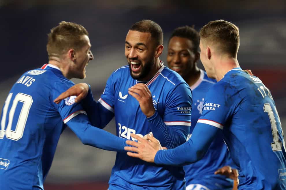 Kemar Roofe celebrates a goal with his team-mates