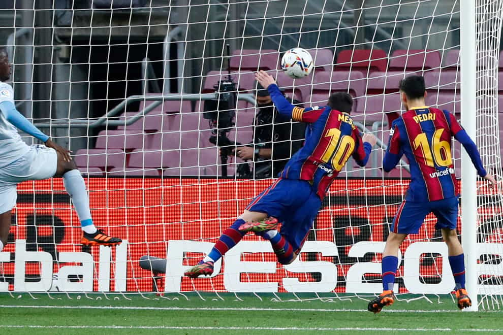 Lionel Messi, centre, scores his 643rd Barcelona goal
