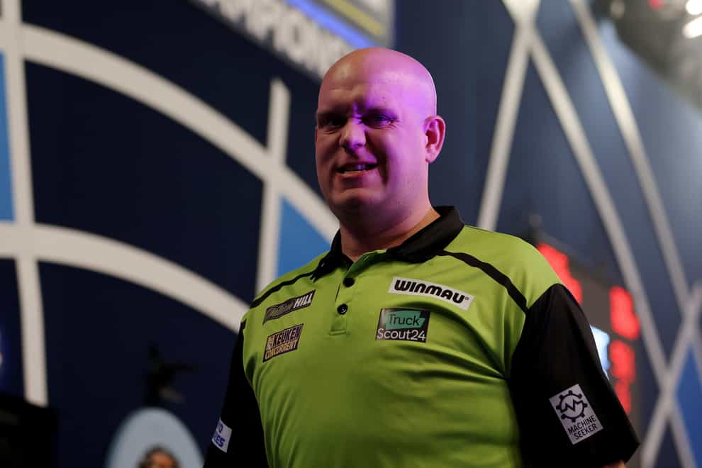 Michael Van Gerwen reacts on stage at the William Hill World Darts Championship at Alexandra Palace