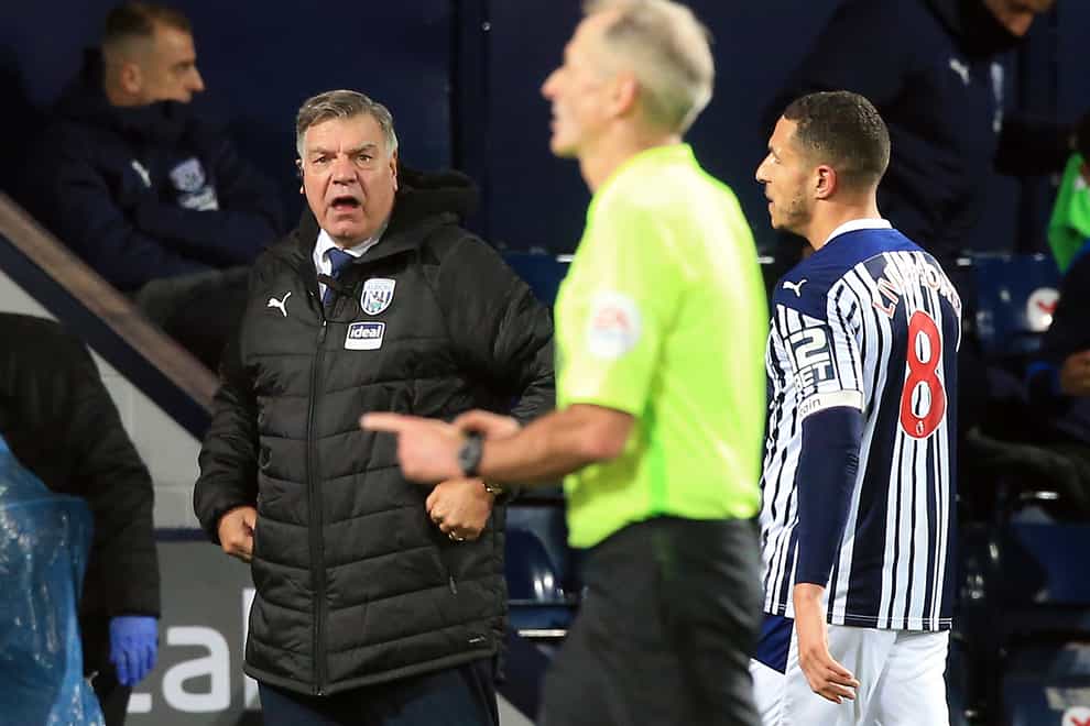 Sam Allardyce, left, shows his frustration after Jake Livermore, right, is sent off