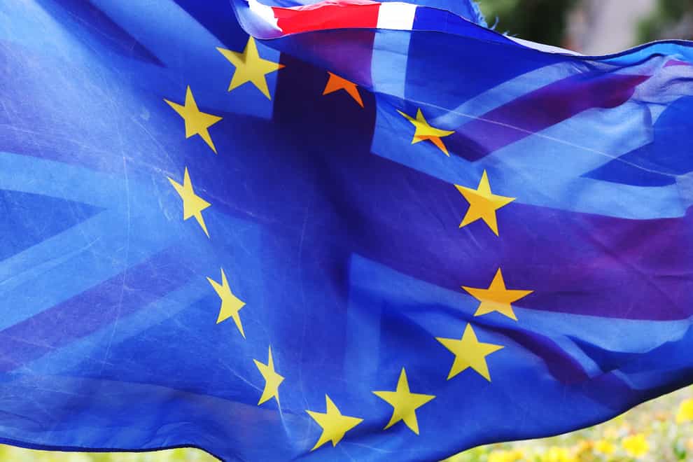 Flags of the EU and Britain fly together