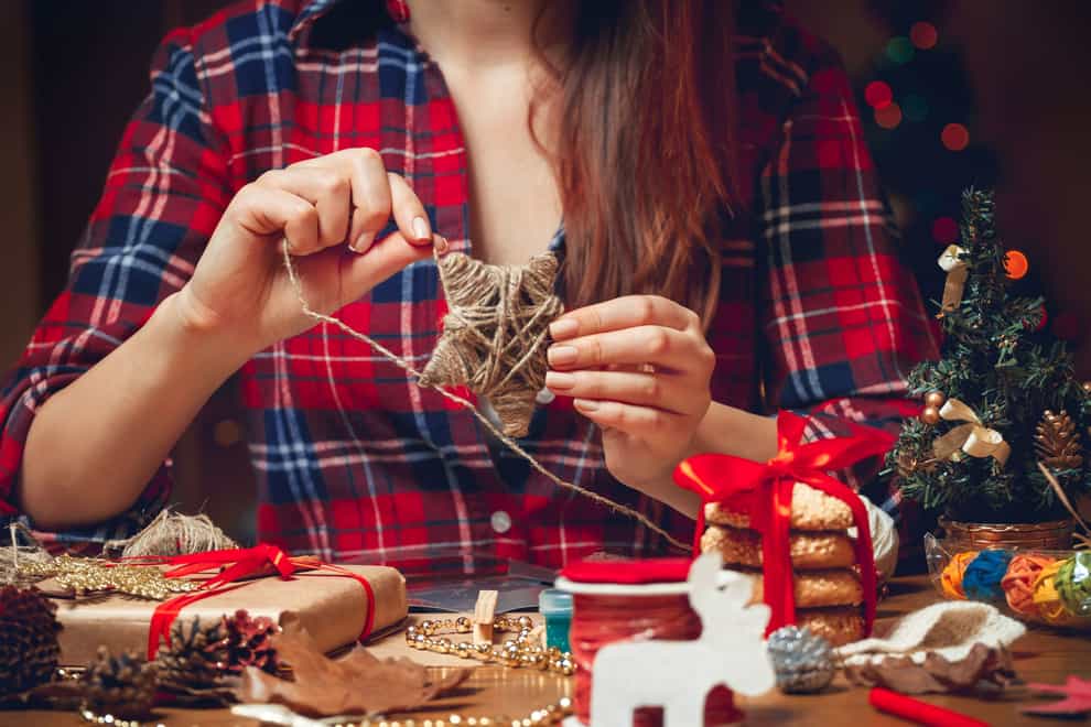 Woman making handmade Christmas gifts
