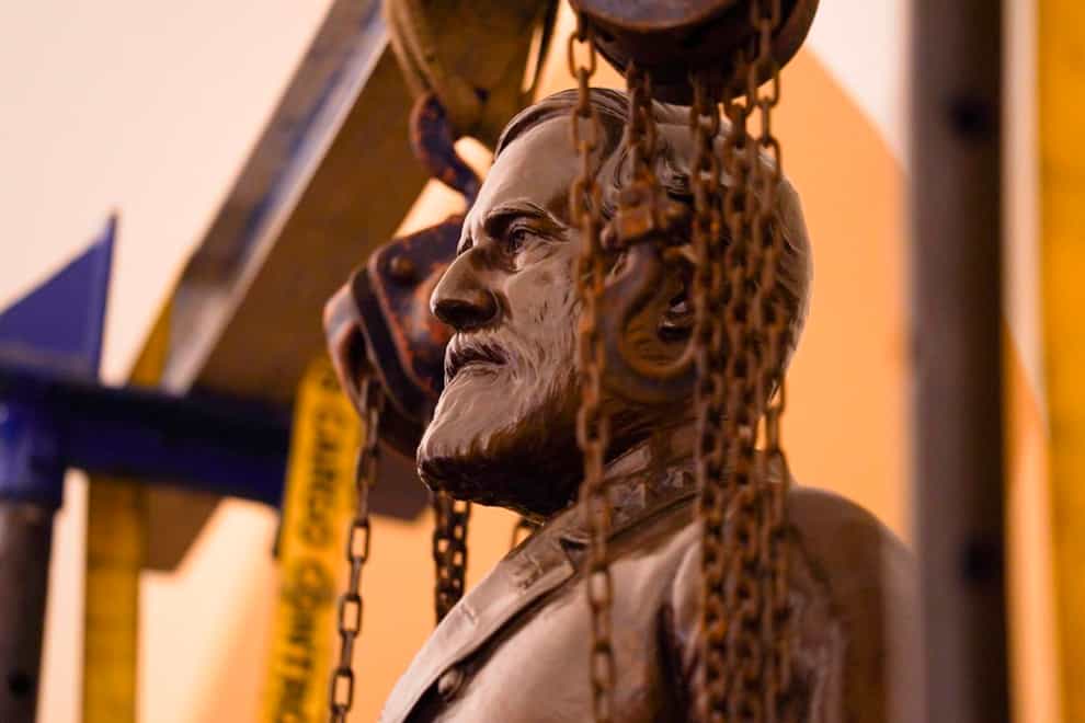 A statue of Confederate General Robert E Lee being removed from the National Statuary Hall Collection in Washington