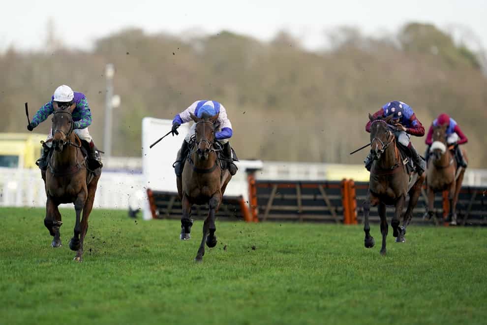 Thyme Hill (left) leads over the last from Roksana and eventual winner Paisley Park (right)