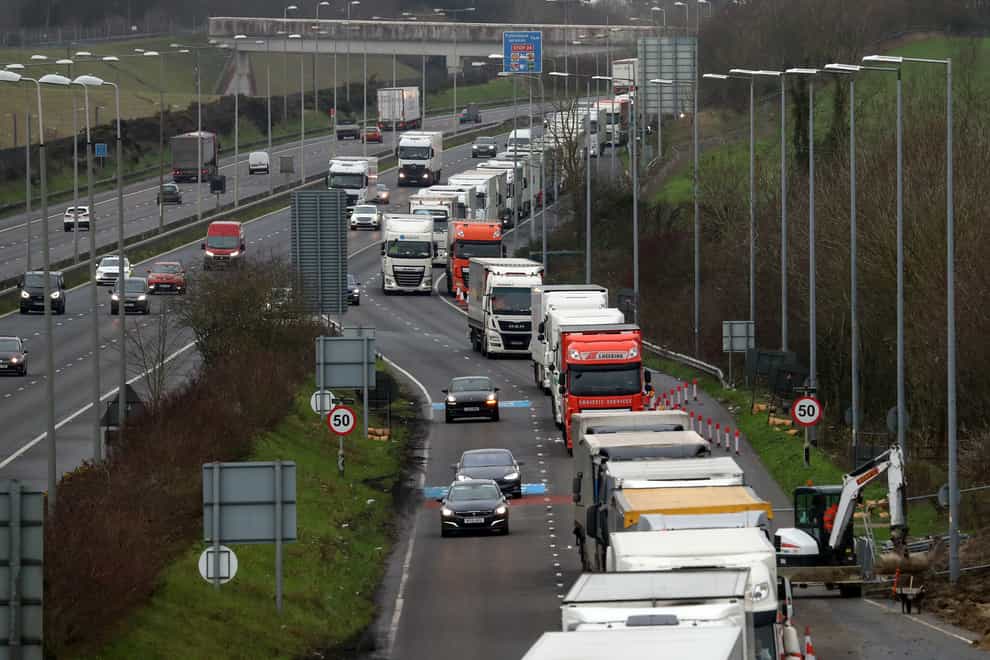 Lorries queue to enter the Eurotunnel site in Folkestone, Kent, due to heavy freight traffic