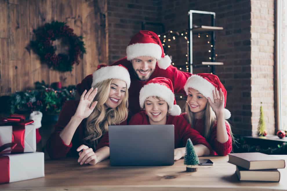 Family at Christmas making a festive video call