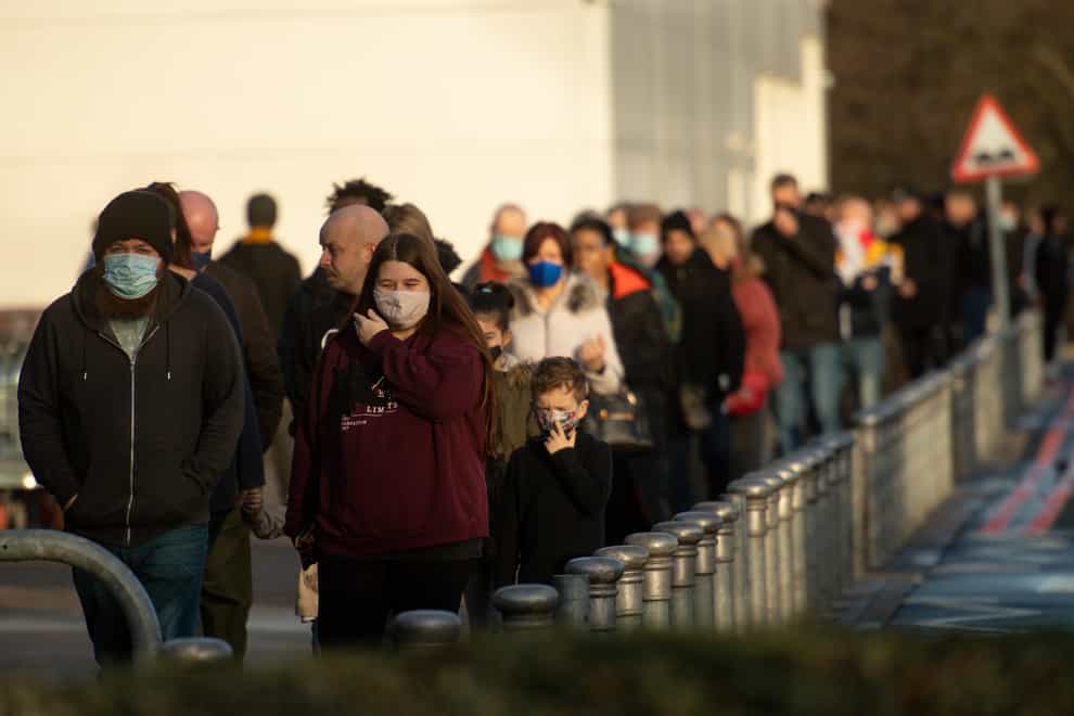 Shoppers queue at a Costco wholesalers in Birmingham ahead of Christmas (Jacob King/PA)