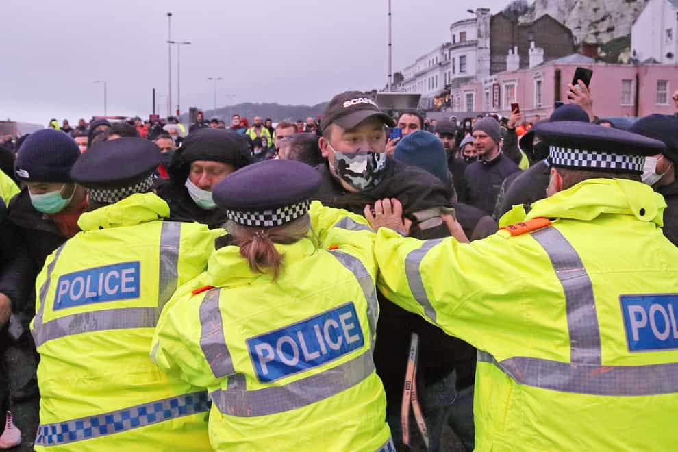 Police restrain drivers trying to enter the Port of Dover (Steve Parsons/PA)