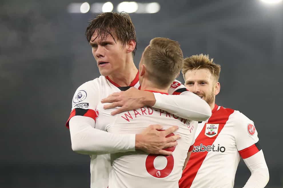 Southampton defender Jannik Vestergaard (left) celebrates with his team-mates after scoring a goal