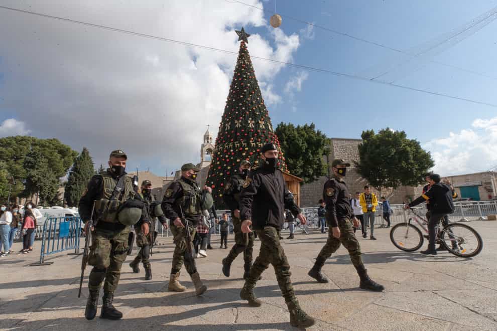 A Palestinian National security unit is deployed at Manger Square, adjacent to the Church of the Nativity, traditionally believed by Christians to be the birthplace of Jesus Christ, ahead of Christmas, in the West Bank city of Bethlehem (Nasser Nasser/AP)