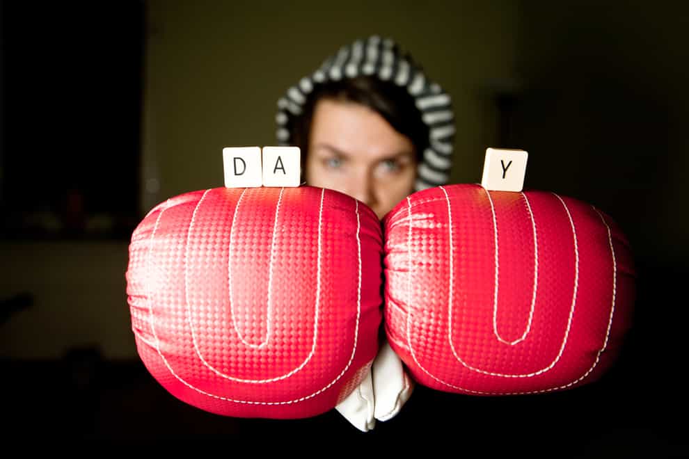 Boxing Day: Female Boxer With Tiles Spelling “Day”