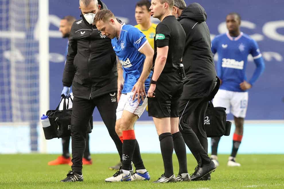 Rangers' Scott Arfield is helped off the pitch during the Scottish Premiership match against Hibernian