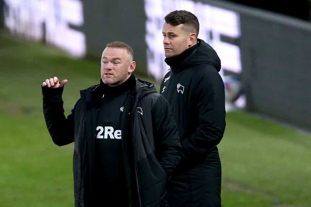 Wayne Rooney (left) remained upbeat despite Derby's loss to Preston