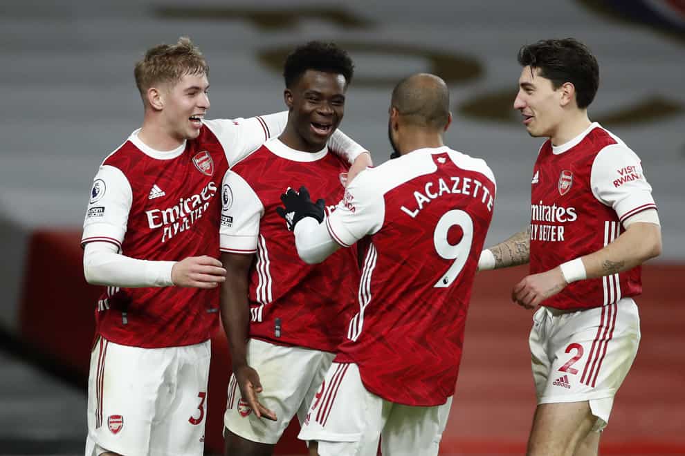 Bukayo Saka (second left) scored Arsenal's third in a convincing win over Chelsea