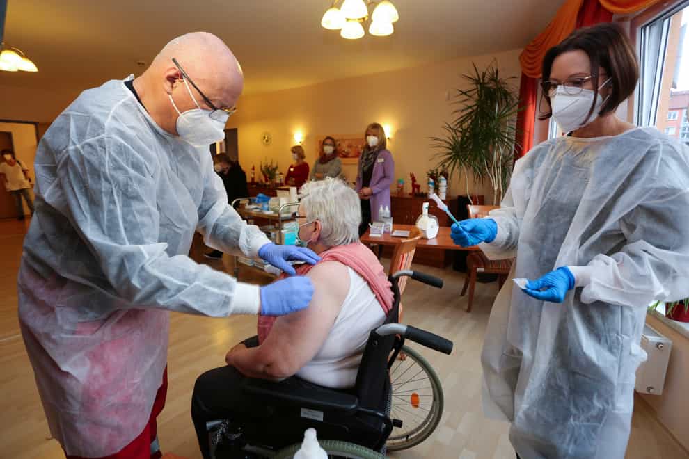 A nursing home resident is vaccinated in Halberstadt, Germany