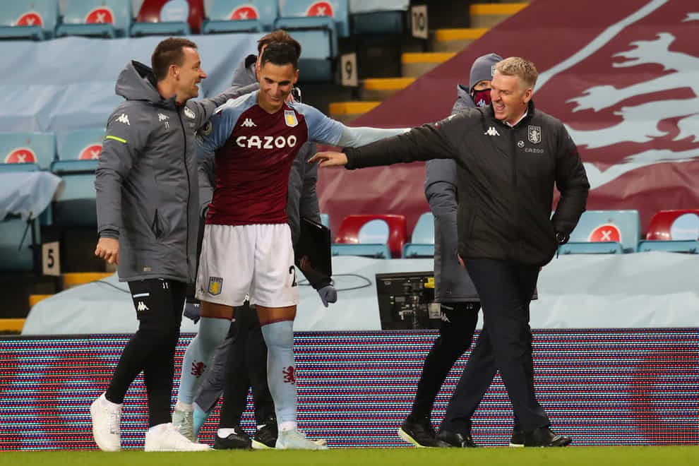 Dean Smith, right, watched Aston Villa win 3-0 on Boxing Day