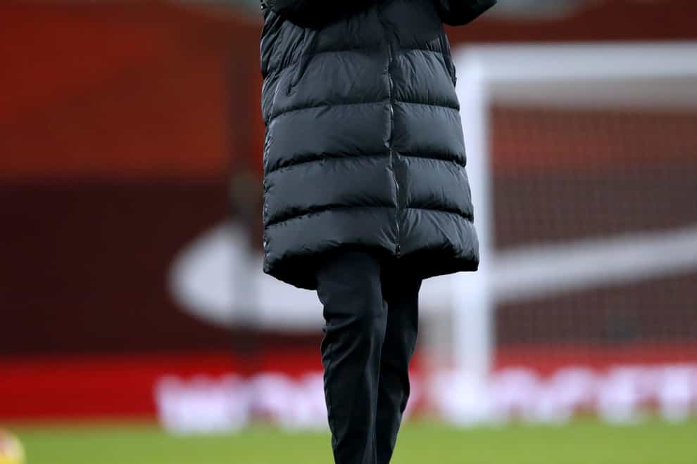 Jurgen Klopp applauds the Liverpool fans