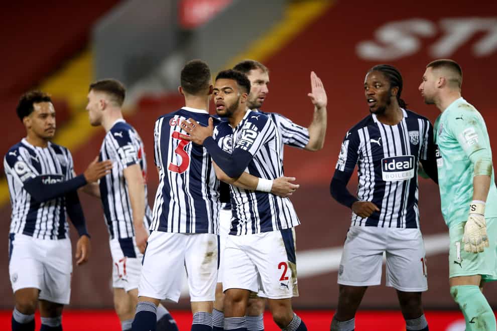 West Brom celebrate a hard-earned point after the final whistle at Liverpool