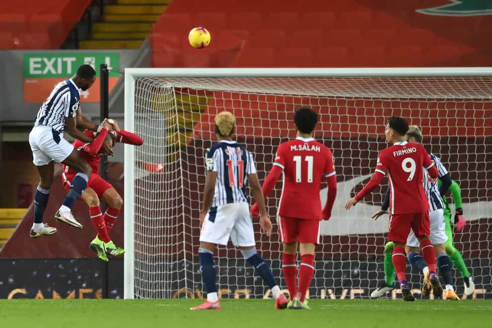 West Brom’s Semi Ajayi heads his side level at Liverpool